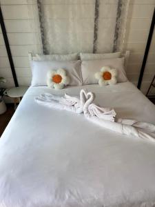 Postel nebo postele na pokoji v ubytování Lantamangrove