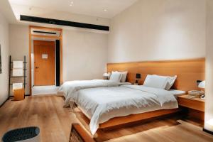 Voodi või voodid majutusasutuse Adamu Nature Resort toas