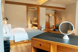 Voodi või voodid majutusasutuse Adamu Nature Resort toas