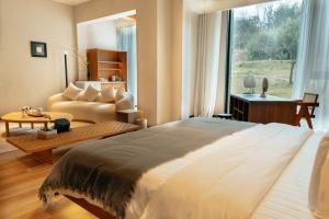 Voodi või voodid majutusasutuse Adamu Nature Resort toas
