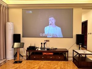 TV a/nebo společenská místnost v ubytování TuWen图汶小苑