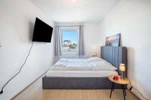 Una cama o camas en una habitación de Fewo Danzig 2