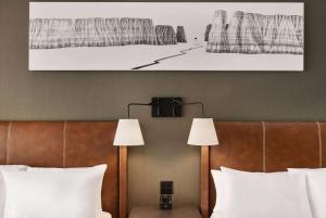 Postel nebo postele na pokoji v ubytování Origin Red Rocks, a Wyndham Hotel