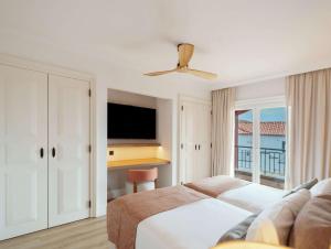 Dreams Madeira Resort Spa & Marina客房内的一张或多张床位