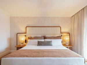 Dreams Madeira Resort Spa & Marina客房内的一张或多张床位