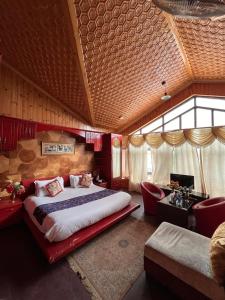 Postel nebo postele na pokoji v ubytování Hotel Ahmad Resorts