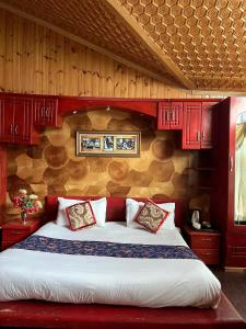 Postel nebo postele na pokoji v ubytování Hotel Ahmad Resorts