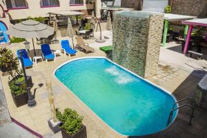 Bassenget på eller i nærheten av Capital O Hotel Dos Mares, Cabo San Lucas