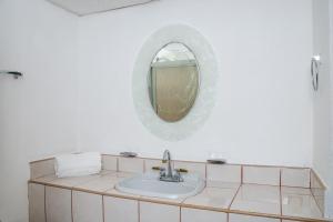 Et bad på Capital O Hotel Dos Mares, Cabo San Lucas