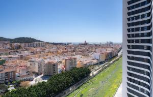 Pemandangan umum bagi Málaga atau pemandangan bandar yang diambil dari apartmen