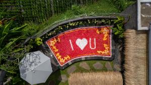 Giardino di The Macaw Ubud Green Uma Villa