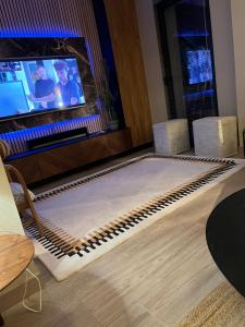 TV a/nebo společenská místnost v ubytování Villa avec piscine 3 chambres 6 couchages
