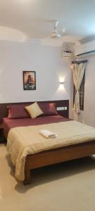 Postel nebo postele na pokoji v ubytování Nest Budget Inn + 19 fotografií