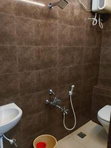 Koupelna v ubytování Nest Budget Inn