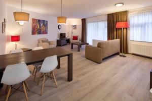 Posezení v ubytování De Pelikaan Texel Appartementen