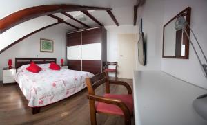En eller flere senge i et værelse på Apartment Split Belvedere