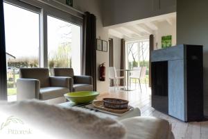 Istumisnurk majutusasutuses PITTORESK, unieke vakantiewoning in Westouter