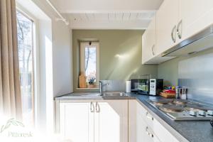 Kuchyň nebo kuchyňský kout v ubytování PITTORESK, unieke vakantiewoning in Westouter + 29 fotografií