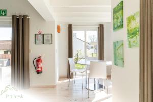 Foto sihtkohas Westouter asuva majutusasutuse PITTORESK, unieke vakantiewoning in Westouter galeriist