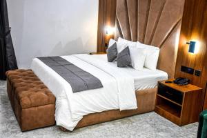 Krevet ili kreveti u jedinici u okviru objekta Tranquila Nest Hotel Kado Abuja