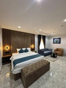 Krevet ili kreveti u jedinici u okviru objekta Tranquila Nest Hotel Kado Abuja