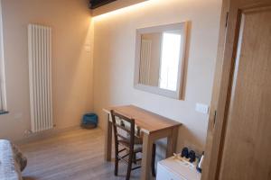 Postel nebo postele na pokoji v ubytování Scorci Di Mare