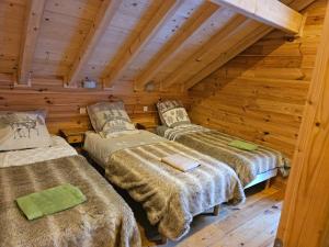 Postel nebo postele na pokoji v ubytování L'Orchidée
