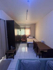 Postel nebo postele na pokoji v ubytování Studio Apartment