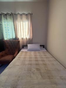 Postel nebo postele na pokoji v ubytování Studio Apartment