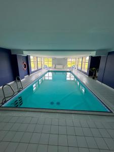 Πισίνα στο ή κοντά στο Chtibourguignon, Appartement dans très agréable résidence avec piscine chauffée et sauna