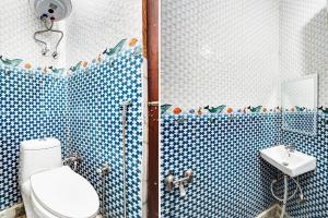 Koupelna v ubytování Super Hotel O Rahul Vihar Ghaziabad + 21 fotografií