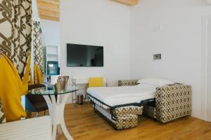 TV a/nebo společenská místnost v ubytování Hotel Città di Parenzo