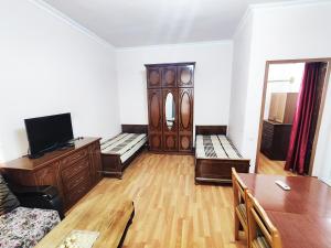 Katil atau katil-katil dalam bilik di Erebuni Family Apartments