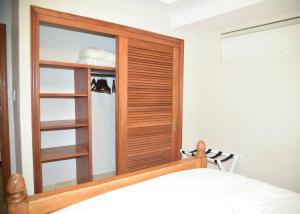 Tranquil Oceanside: Pools & Direct Beach Access客房内的一张或多张床位