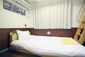 Postel nebo postele na pokoji v ubytování Quiet Area, Close to Station, Central Shinjuku, Room 202