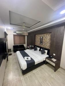Postel nebo postele na pokoji v ubytování Prashant Hotel