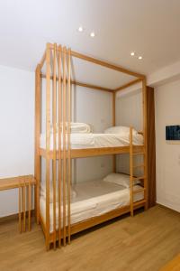 Postel nebo postele na pokoji v ubytování Hotel Nimfa