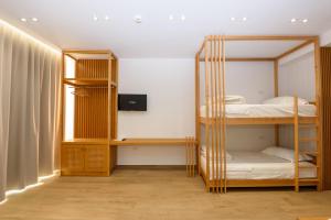 Postel nebo postele na pokoji v ubytování Hotel Nimfa
