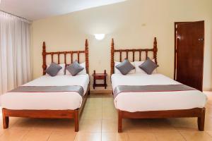 Voodi või voodid majutusasutuse Collection O Hotel Mocambo, Boca del Río toas