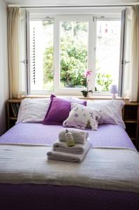 Postel nebo postele na pokoji v ubytování Villa Apollo B&B