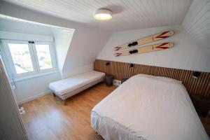 Ένα ή περισσότερα κρεβάτια σε δωμάτιο στο Nice house with south-facing terrace