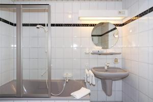 Koupelna v ubytování Hotel garni Poggenstool