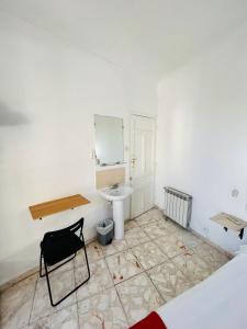 Ένα μπάνιο στο Pensión Rivera