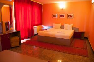 Postel nebo postele na pokoji v ubytování Hotel Ertancom