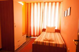Postel nebo postele na pokoji v ubytování Hotel Ertancom