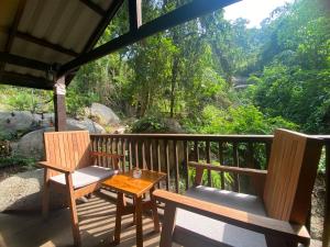 Μπαλκόνι ή βεράντα στο Singing Frogs Jungle Bungalow