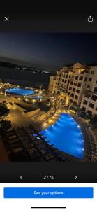 a picture of a swimming pool in a hotel at Samarah Resort D27 Families only in Sowayma