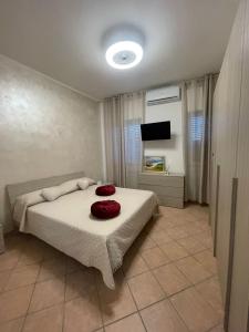 En eller flere senge i et værelse på Calafuria