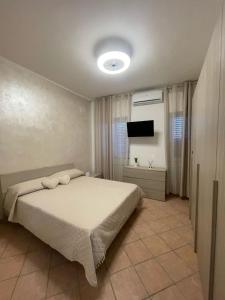 En eller flere senge i et værelse på Calafuria