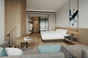Voodi või voodid majutusasutuse Fairfield by Marriott Quanzhou Fengze toas